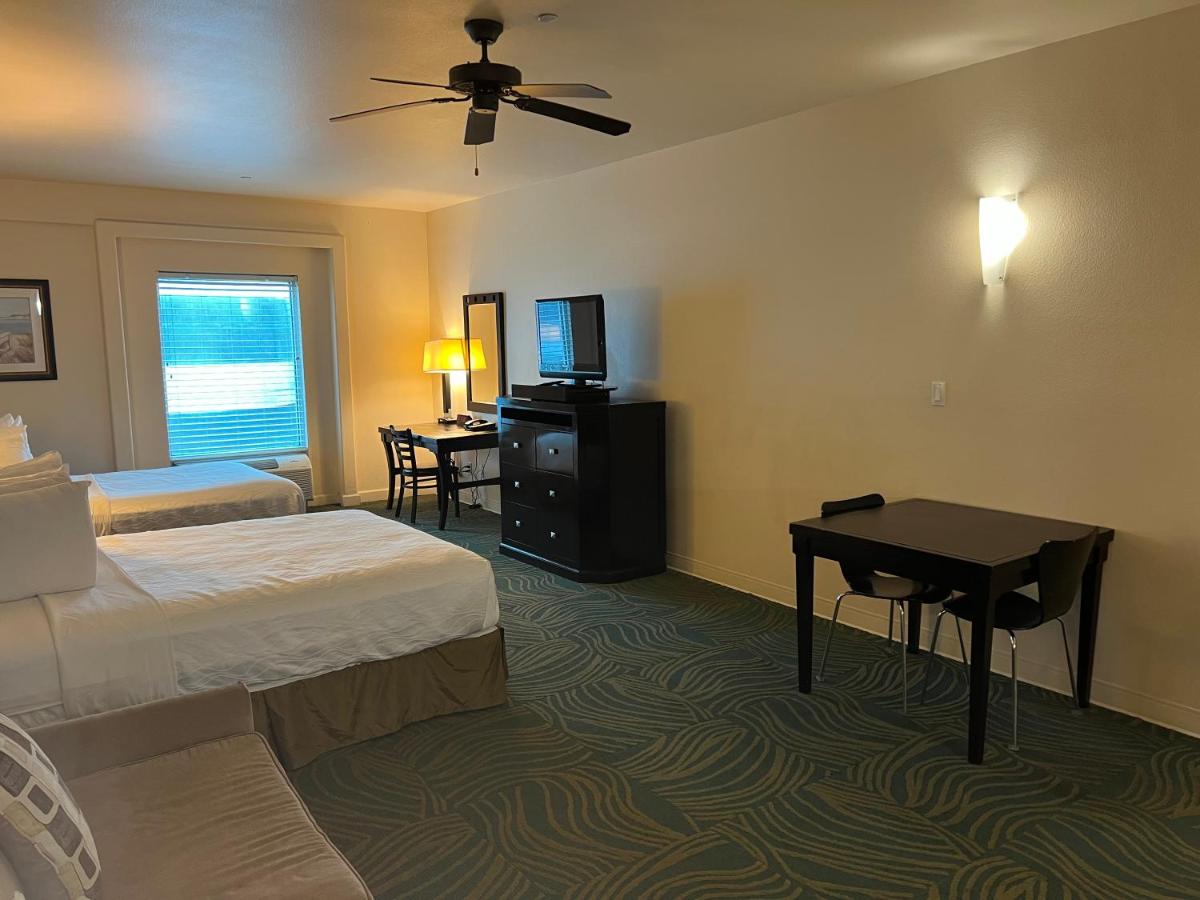 Queen Suite with Two Queen Beds and Sofa Bed at Sunchase Inn & Suites