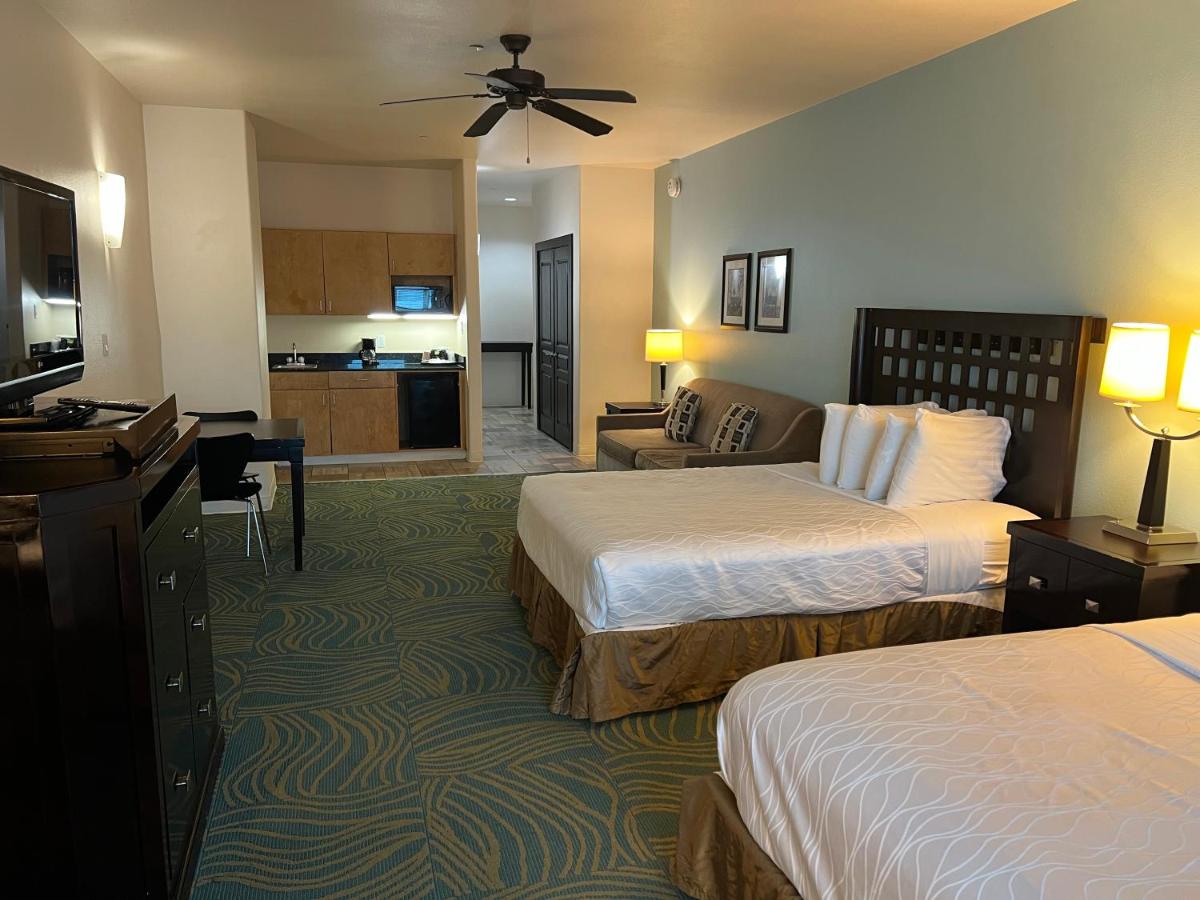 Queen Suite with Two Queen Beds and Sofa Bed at Sunchase Inn & Suites