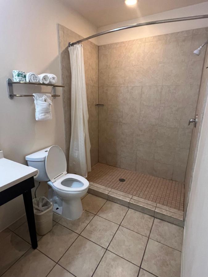 Queen Suite with Two Queen Beds and Sofa Bed at Sunchase Inn & Suites