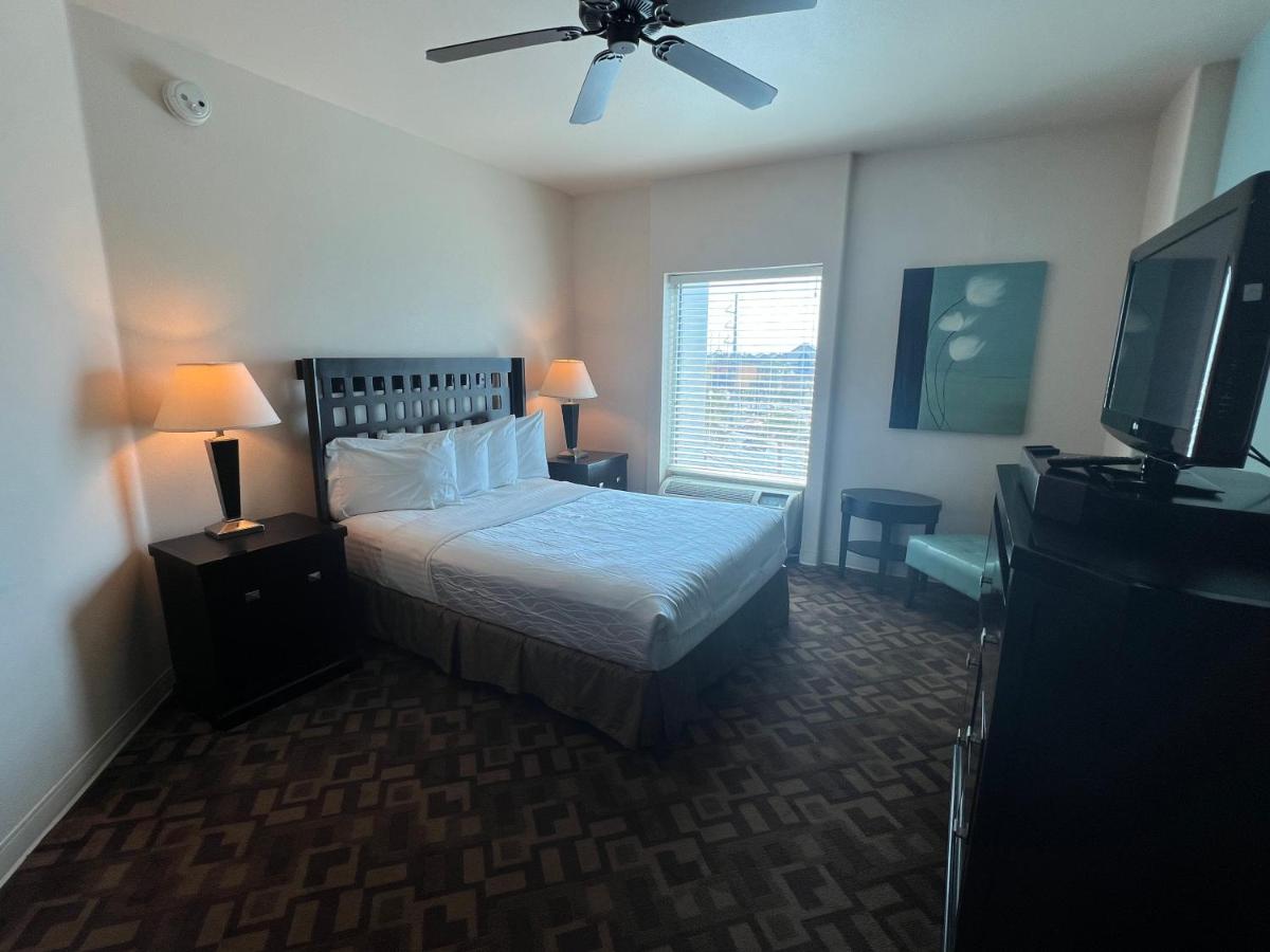 Queen Suite with Sofa Bed at Sunchase Inn & Suites