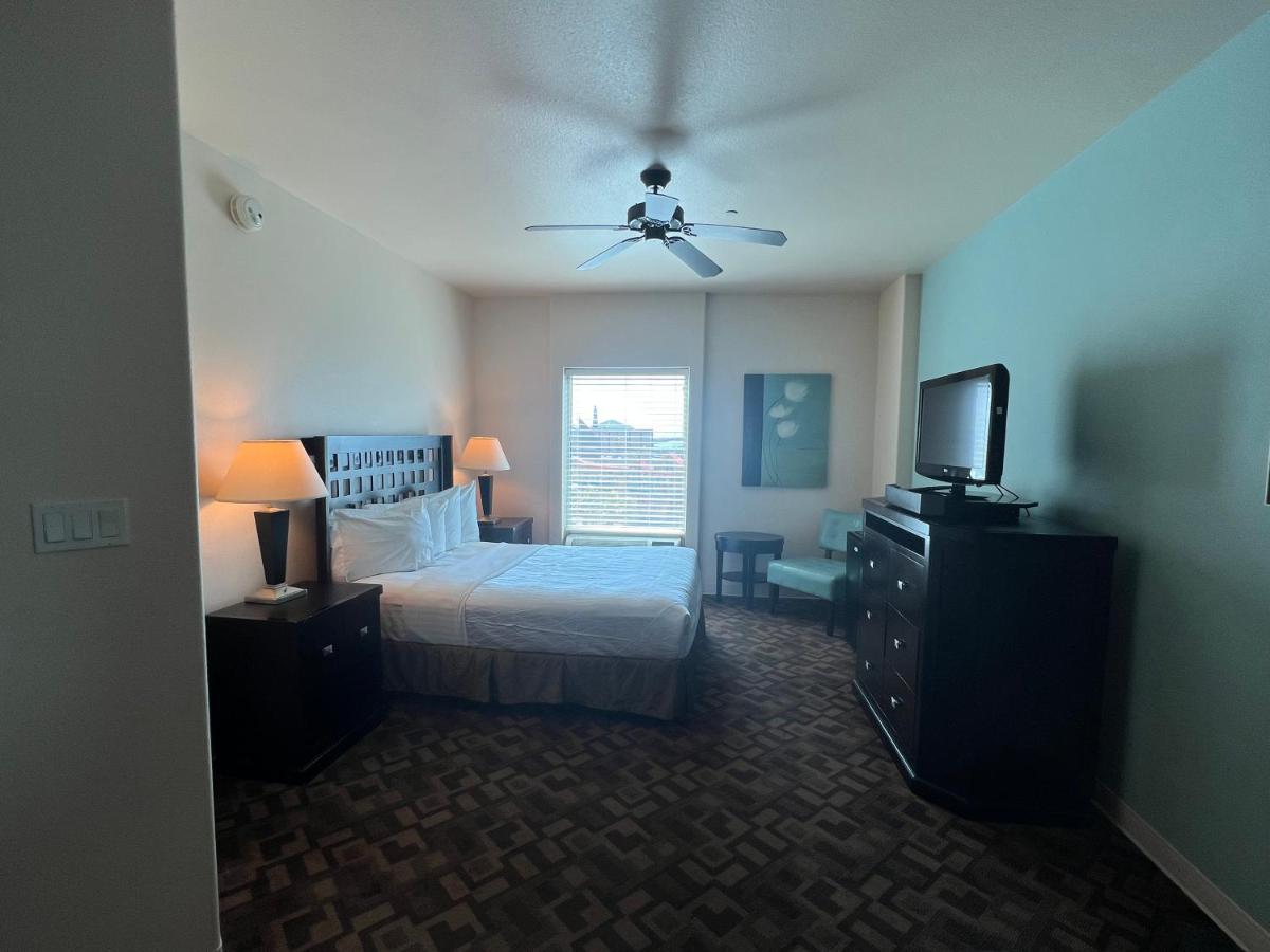 Queen Suite with Sofa Bed at Sunchase Inn & Suites