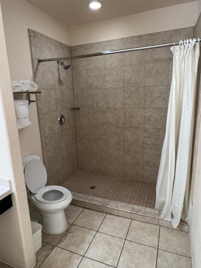 Deluxe King with Kitchenette and Sofa Bed at Sunchase Inn & Suites