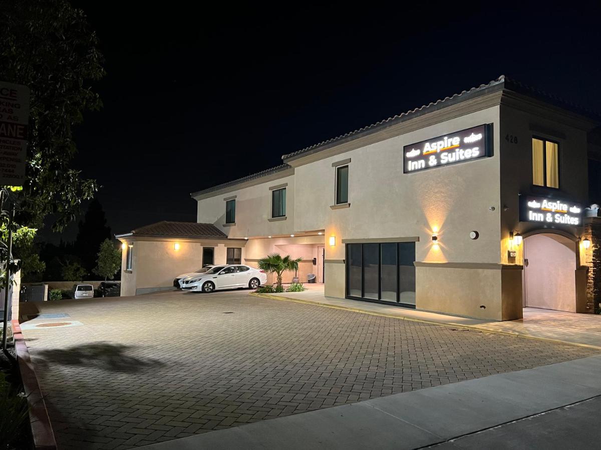 | ASPIRE INN & SUITES