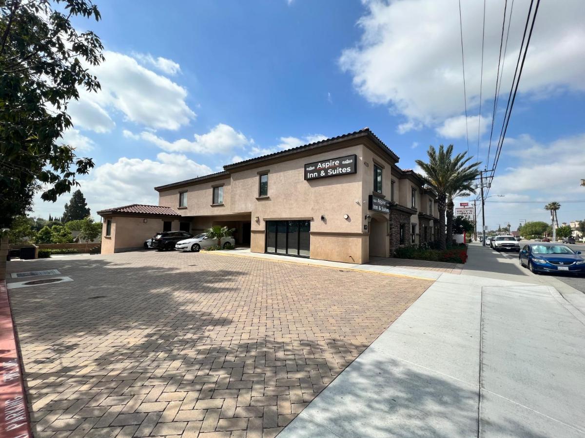 | ASPIRE INN & SUITES