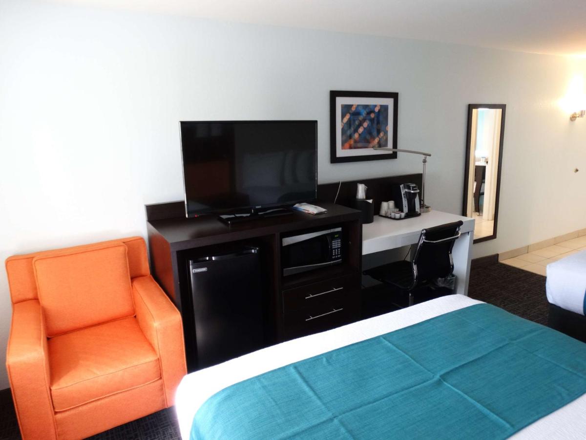 Queen Room with Two Queen Beds at Best Western Plus Orlando Lake Buena Vista South Inn & Suites