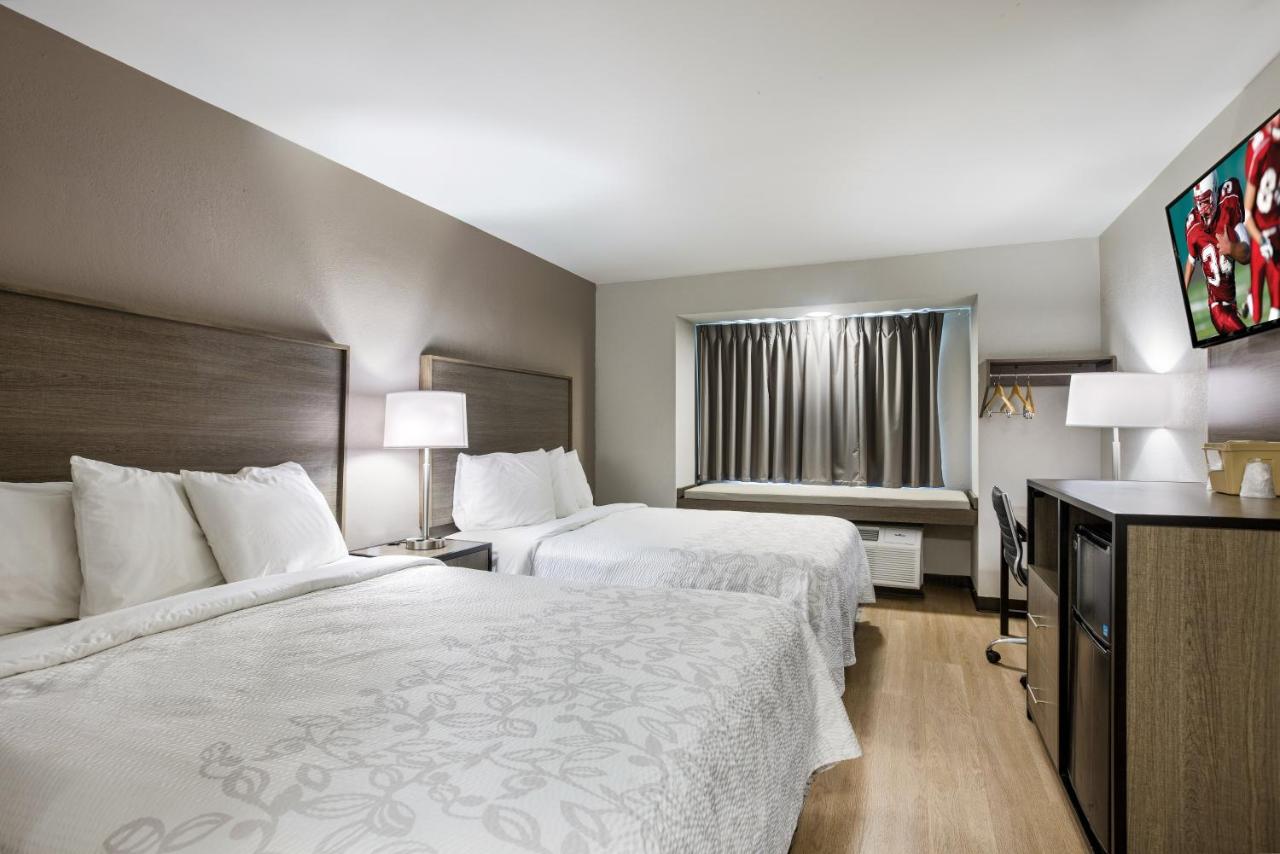 Deluxe Room with 2 Queen Beds Disability Access Smoke Free at Red Roof Inn PLUS+ & Suites Savannah - I-95