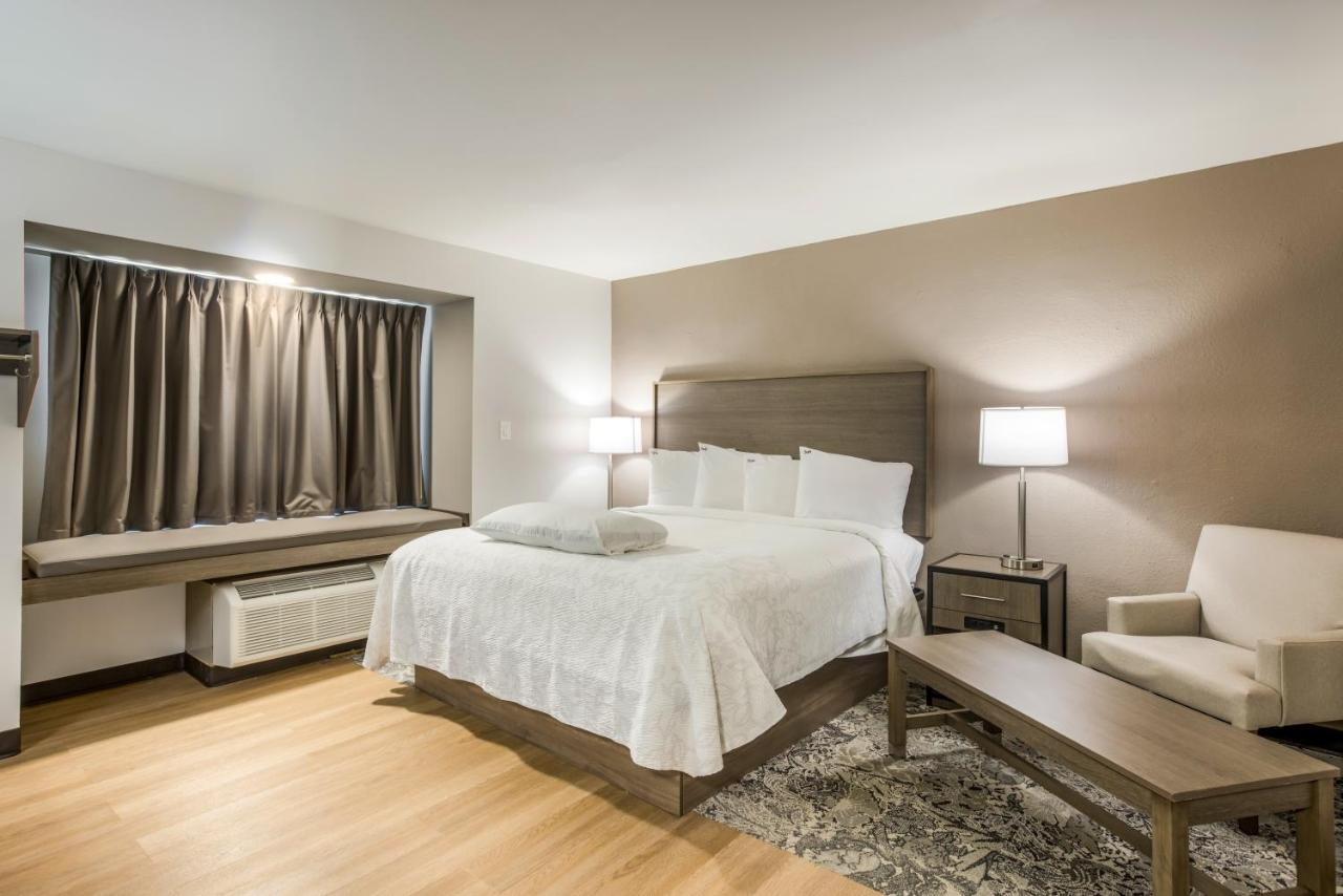 Premium King Room Disability Access Smoke Free (Upgraded Bedding and Snack Box) at Red Roof Inn PLUS+ & Suites Savannah - I-95