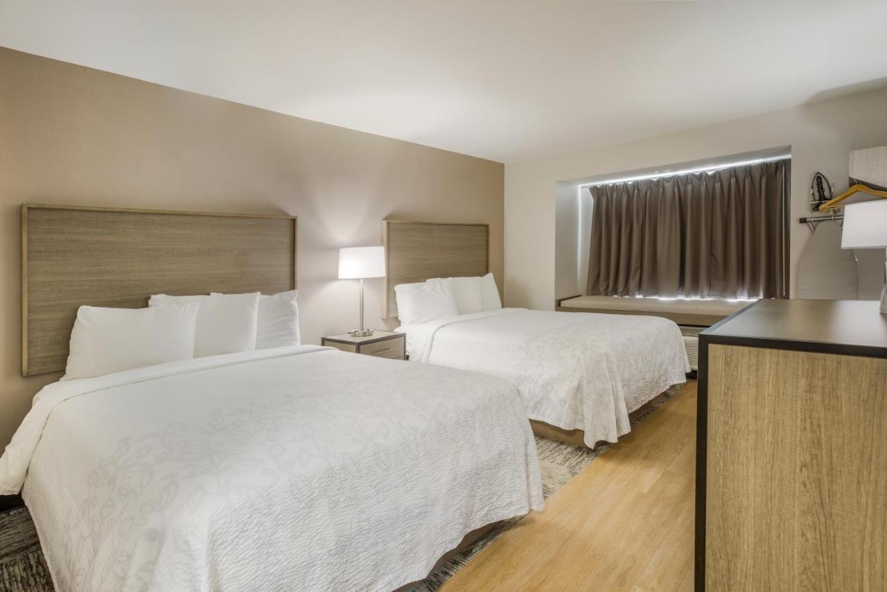 Deluxe Room with 2 Queen Beds Smoke Free at Red Roof Inn PLUS+ & Suites Savannah - I-95