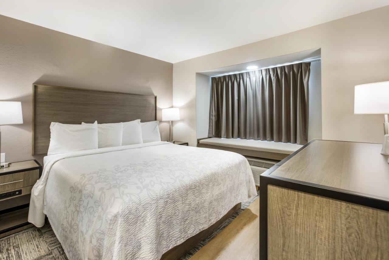 Deluxe King Room Smoke Free at Red Roof Inn PLUS+ & Suites Savannah - I-95