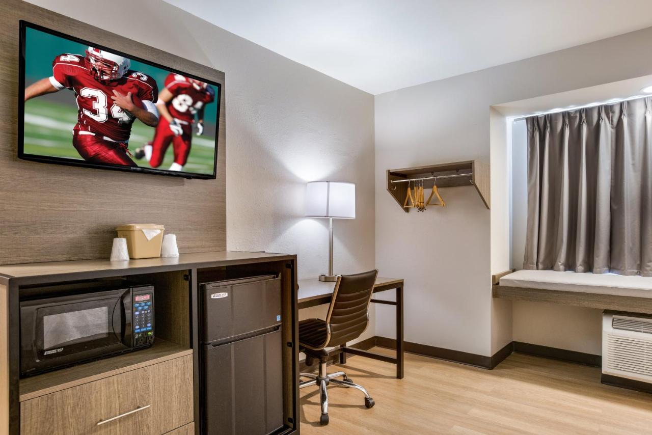Premium King Room Disability Access Smoke Free (Upgraded Bedding and Snack Box) at Red Roof Inn PLUS+ & Suites Savannah - I-95
