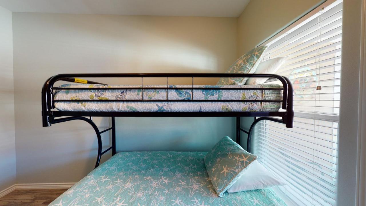 | BC202 Funky Parrot, Heated Saltwater Pool, Short Walk to Beach, Gameroom