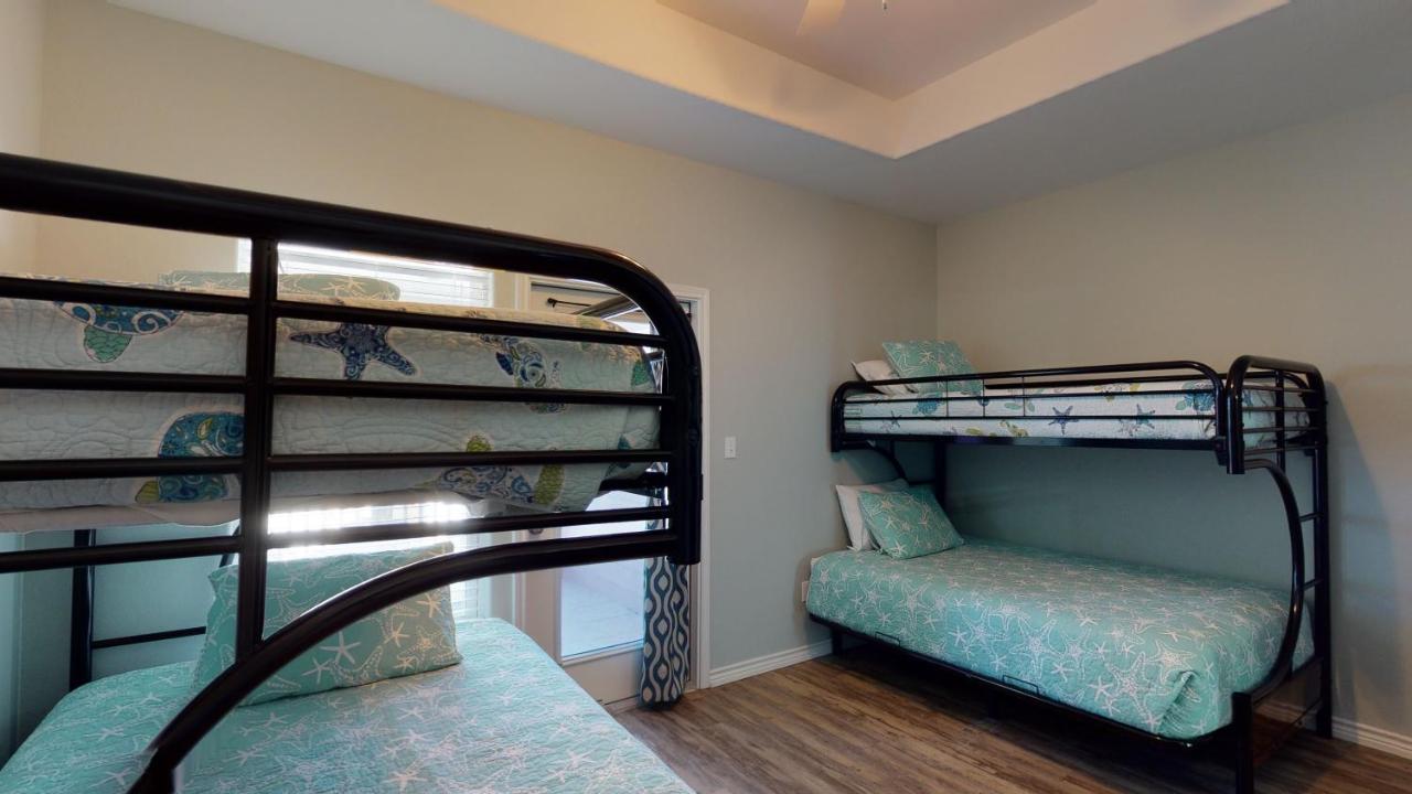 | BC202 Funky Parrot, Heated Saltwater Pool, Short Walk to Beach, Gameroom