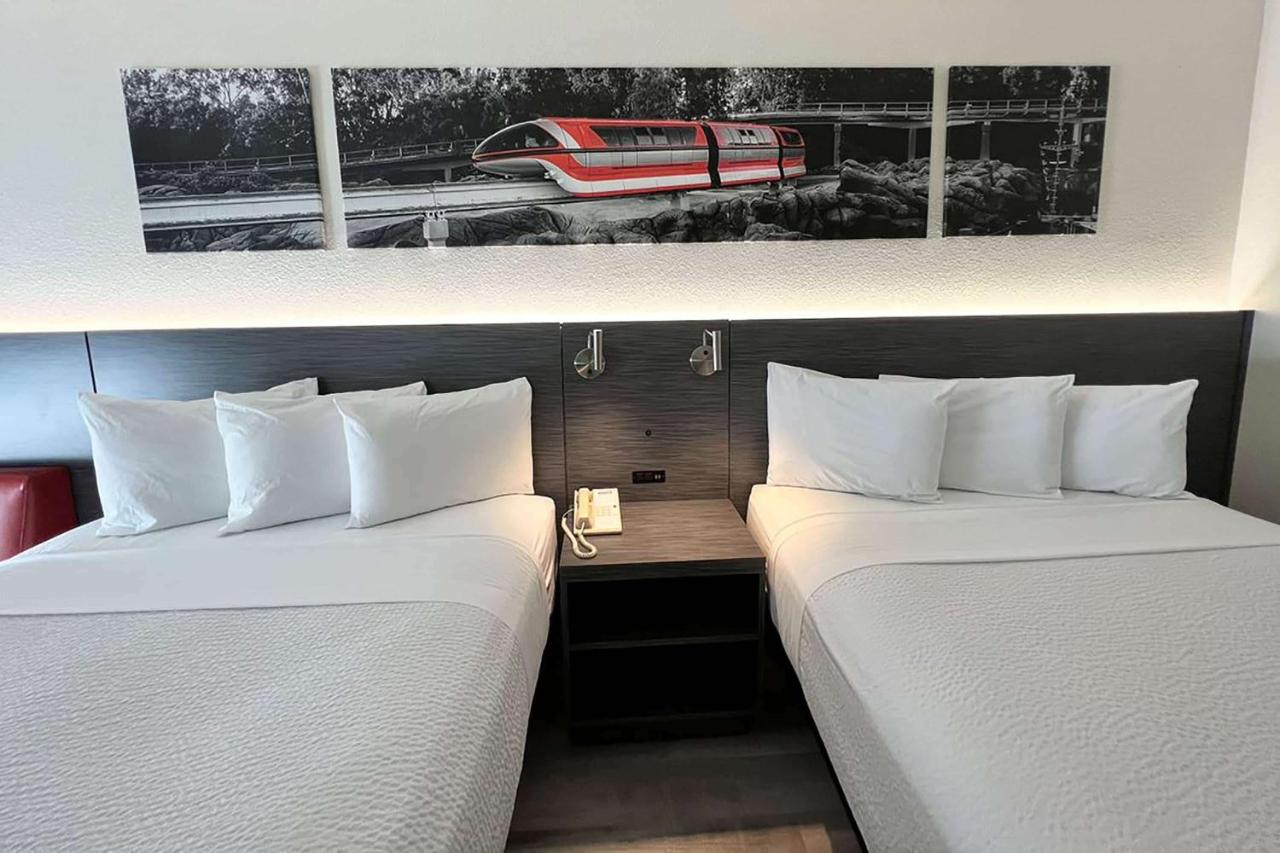 Queen Room with Two Queen Beds and Bath Tub - Mobility/Hearing Accessible - Non-Smoking at Ramada by Wyndham Anaheim Convention Center