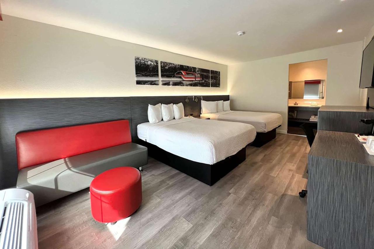 Queen Room with Two Queen Beds and Bath Tub - Mobility/Hearing Accessible - Non-Smoking at Ramada by Wyndham Anaheim Convention Center