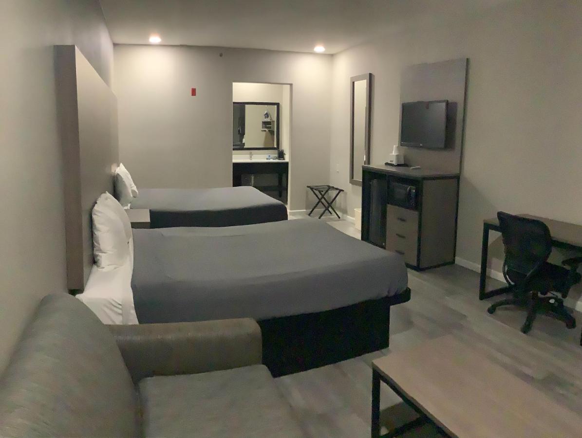 Queen Room with Two Queen Beds at Americas Best Value Inn & Suites San Benito