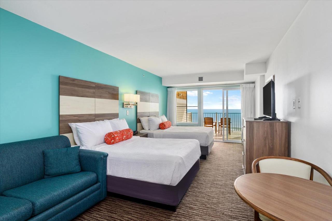 Ocean Front Room with Balcony, 2 Double Beds, Sofa and Kitchenette at Monte Carlo Boardwalk Oceanfront Ocean City