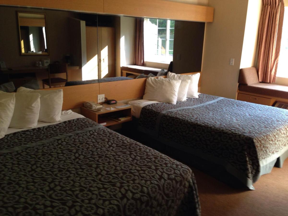 Queen Room with Two Queen Beds - Non-Smoking at Days Inn by Wyndham Sturbridge
