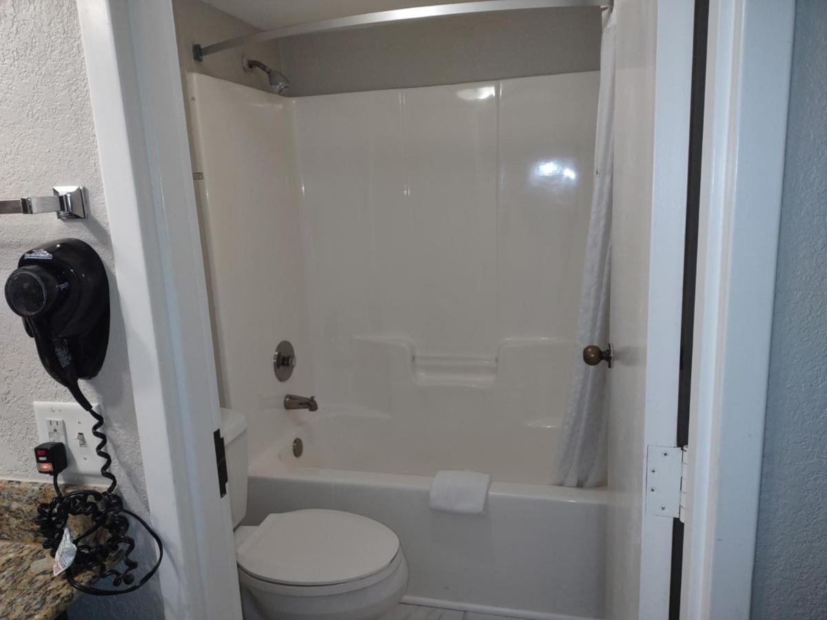 Deluxe Business Queen Room with Two Queen Beds - Non-Smoking at Days Inn by Wyndham Port Charlotte/Punta Gorda