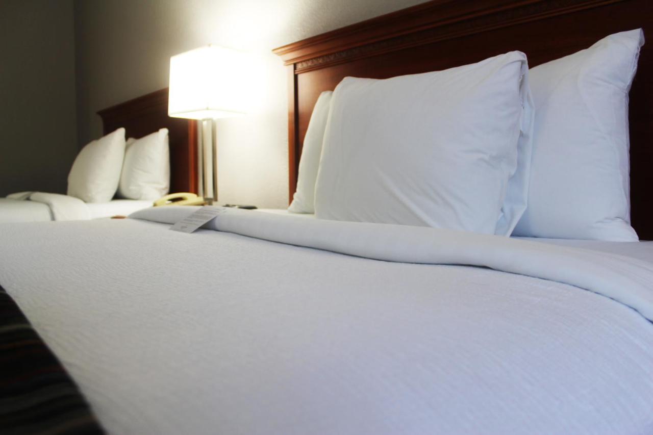 Queen Room with Two Queen Beds - Non-Smoking at Country Inn & Suites by Radisson, San Antonio Lackland AFB - SeaWorld Area