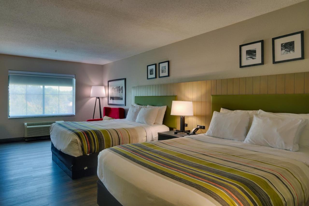 Queen Suite with Two Queen Beds and Sofa Bed - Non-Smoking at Country Inn & Suites by Radisson, Savannah Gateway, GA