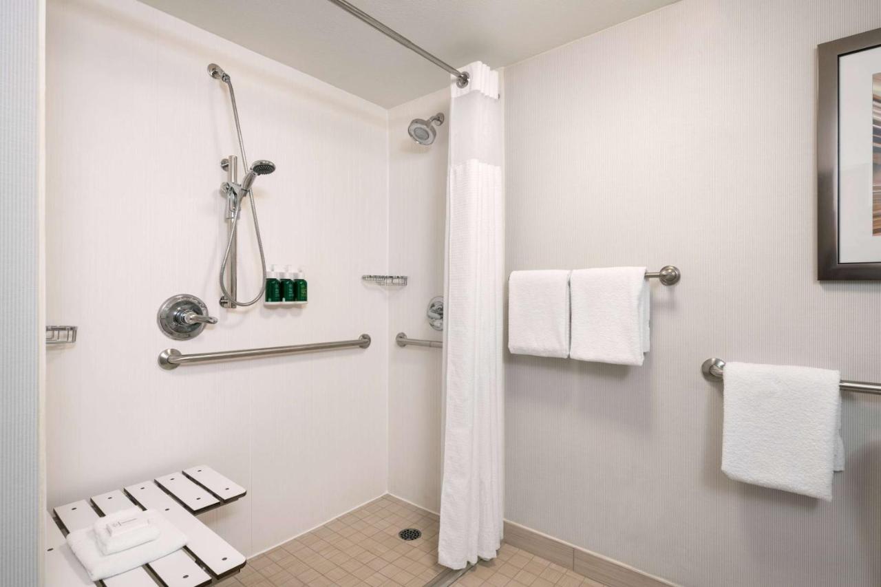 Mobility/Hearing Accessible Guestroom King Roll-In Shower at Sonesta Select Phoenix Camelback