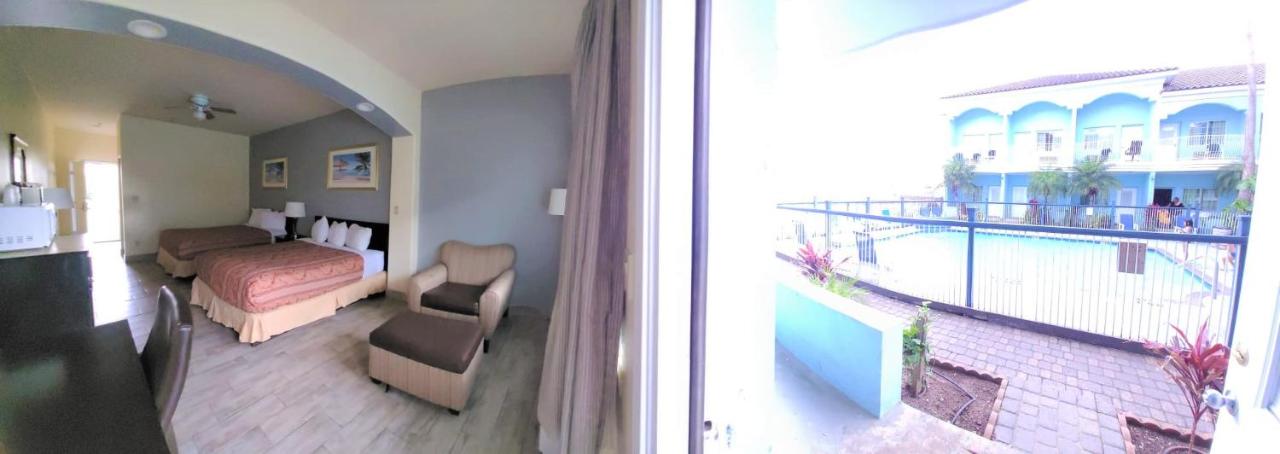 Queen Room with Pool View at Casa Bella Hotel and Suites