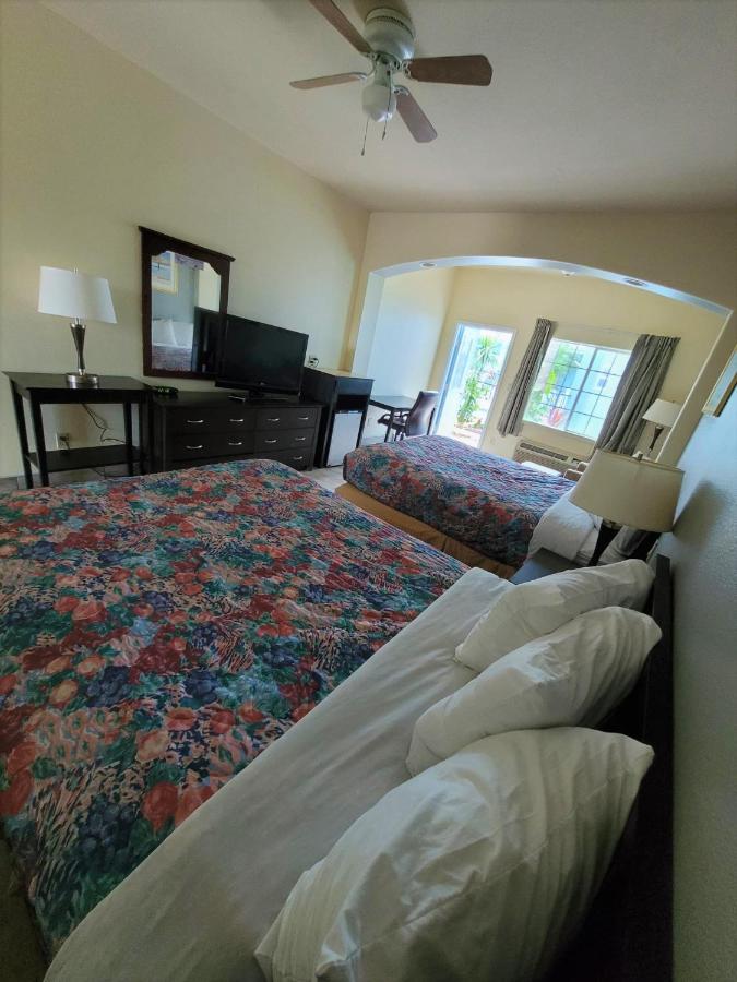 Queen Room with Pool View at Casa Bella Hotel and Suites