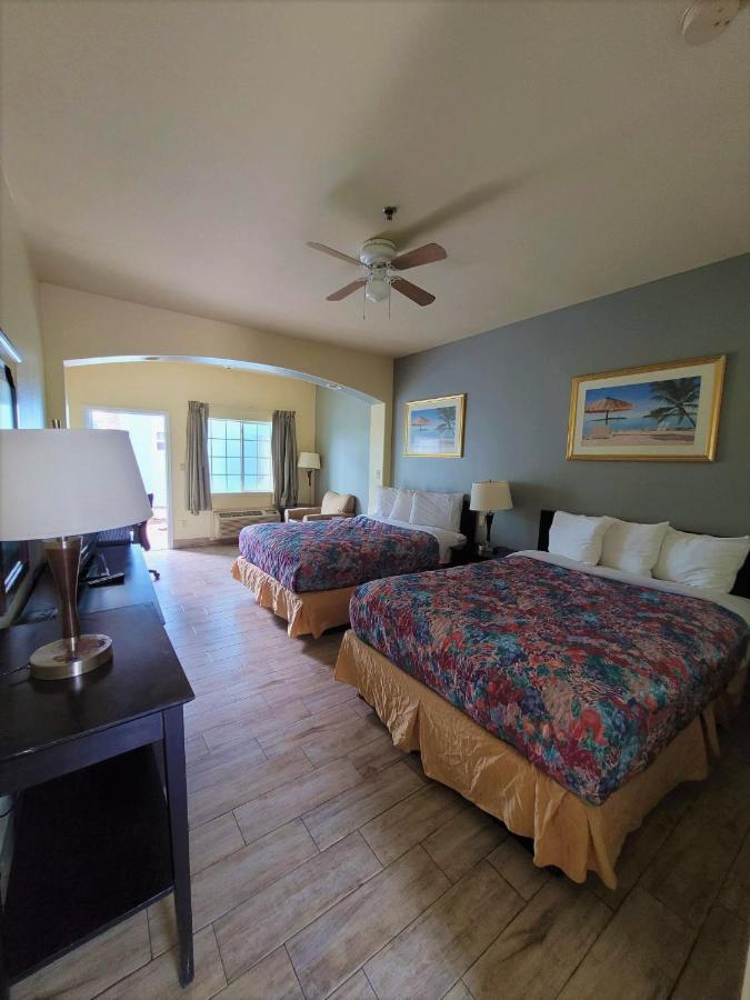 Queen Room with Pool View at Casa Bella Hotel and Suites