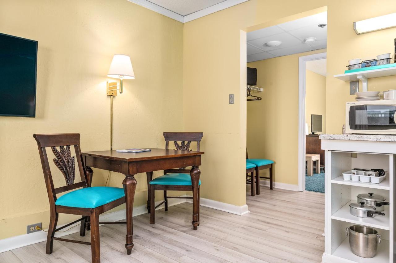 King Suite with Balcony at Cayman Suites Hotel
