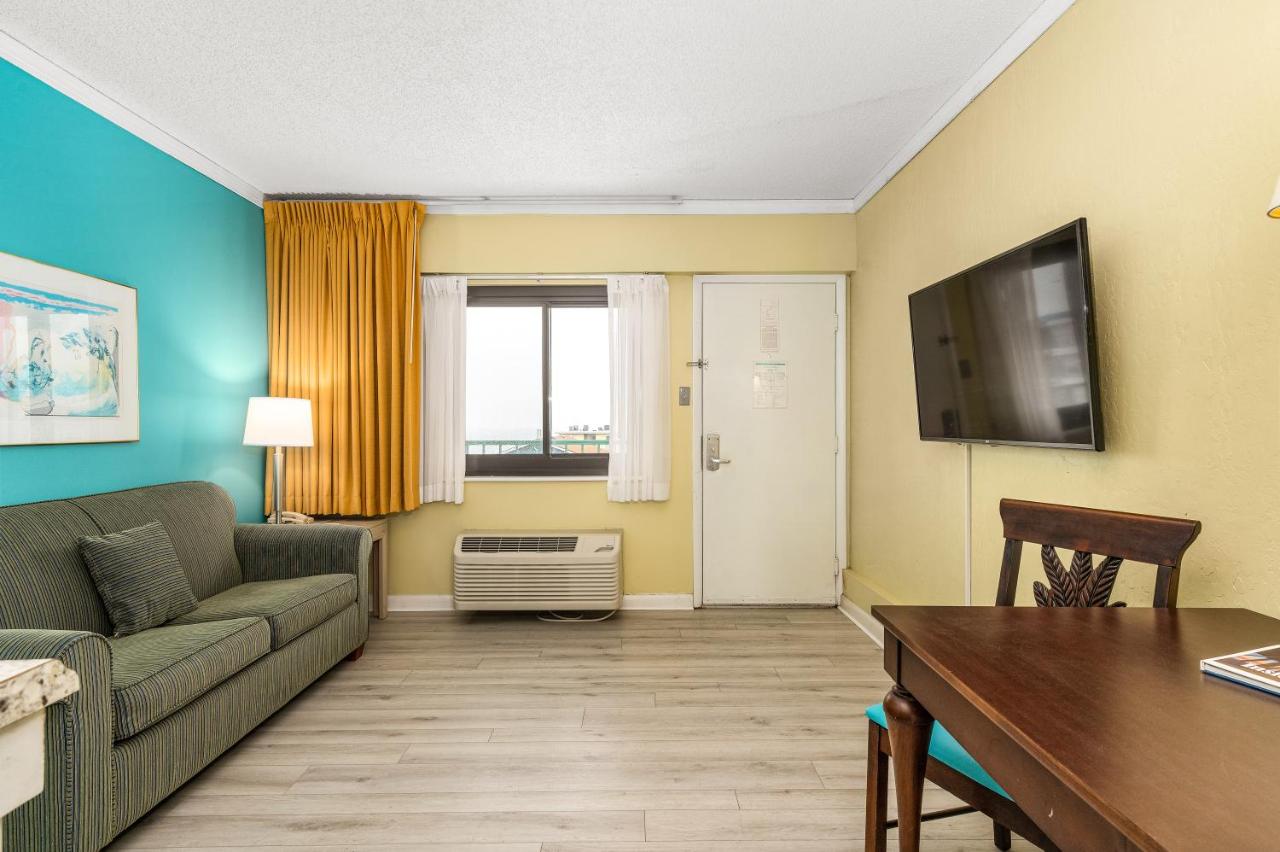 King Suite with Balcony at Cayman Suites Hotel