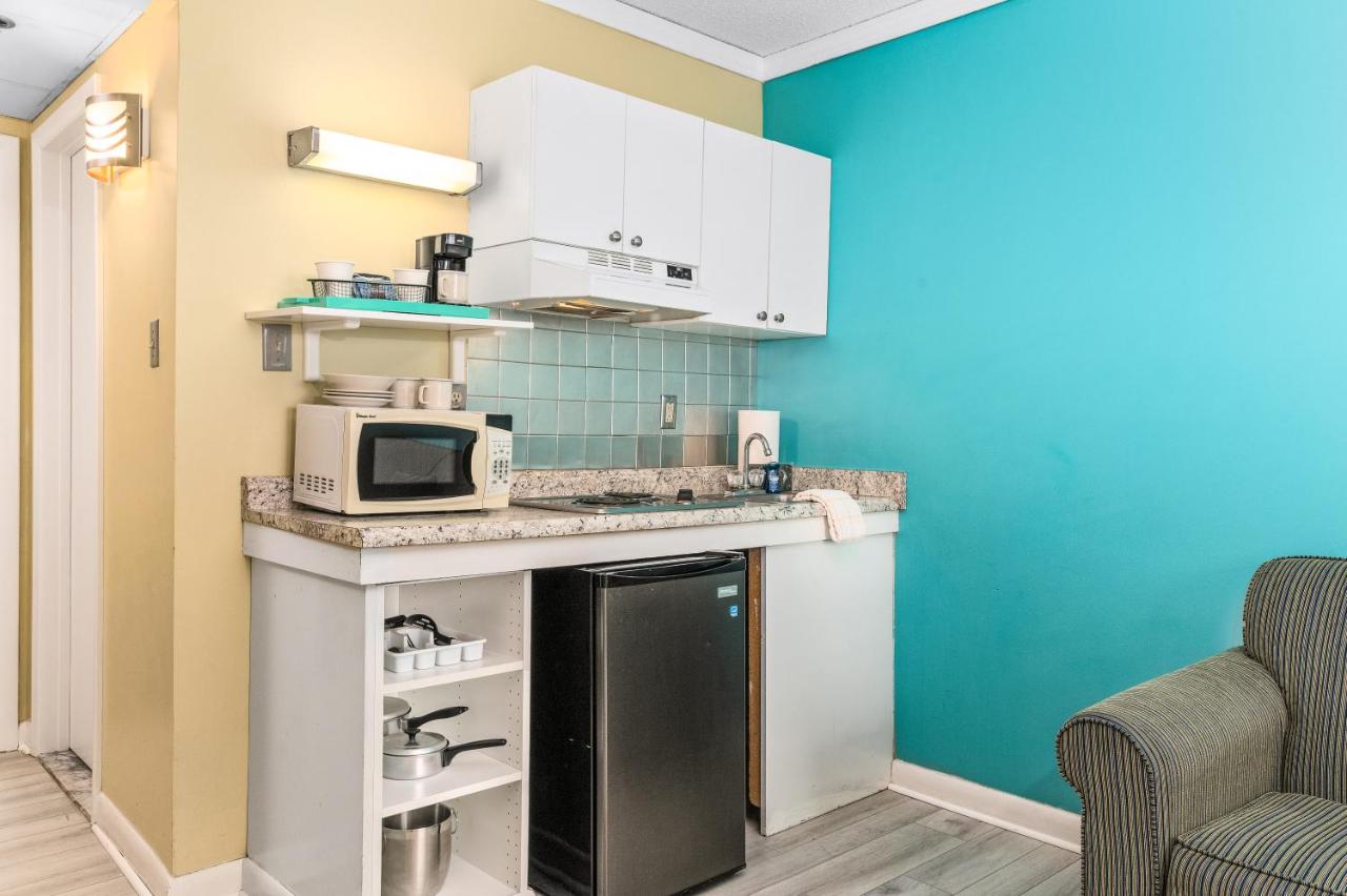 King Suite with Balcony at Cayman Suites Hotel