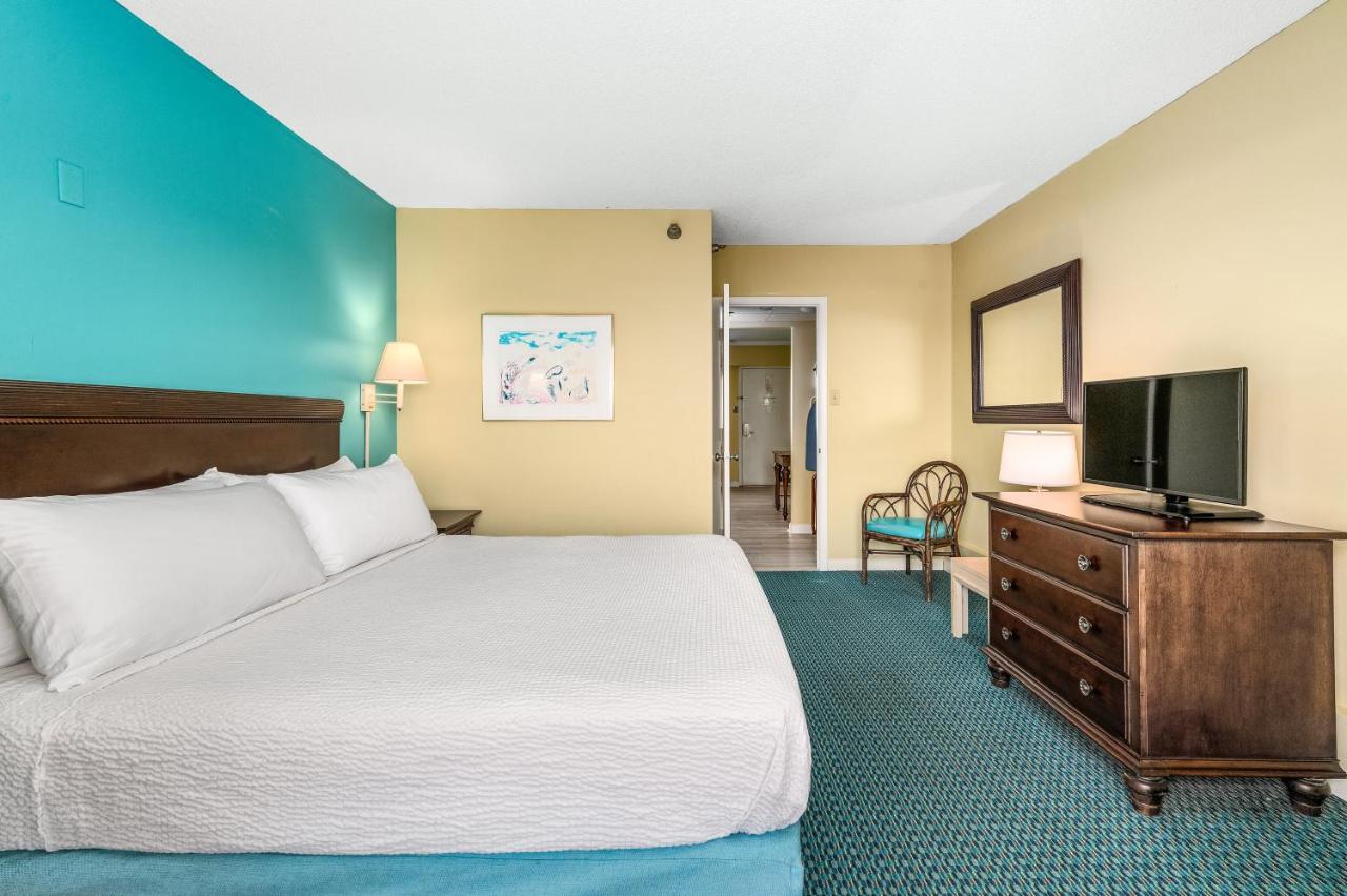 King Suite with Balcony at Cayman Suites Hotel