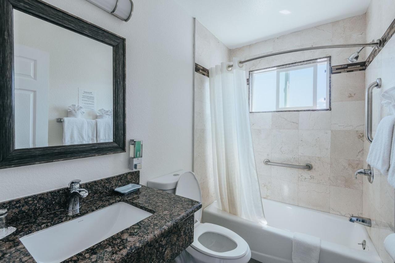 Deluxe Two Queen Bed Room Suite - Upstairs, Non-Smoking, No Pets at Sea Air Inn & Suites - Downtown - Restaurant Row