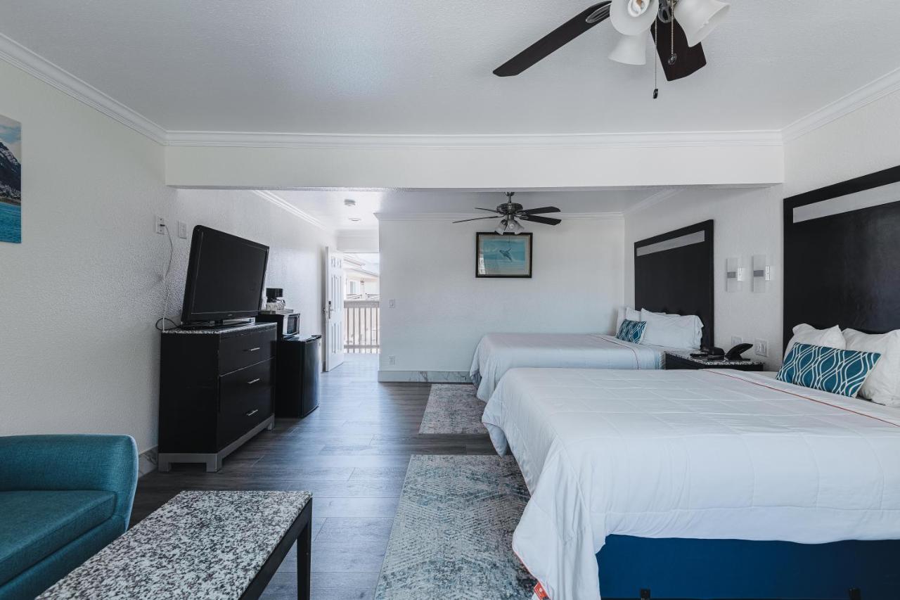 Deluxe Two Queen Bed Room Suite - Upstairs, Non-Smoking, No Pets at Sea Air Inn & Suites - Downtown - Restaurant Row
