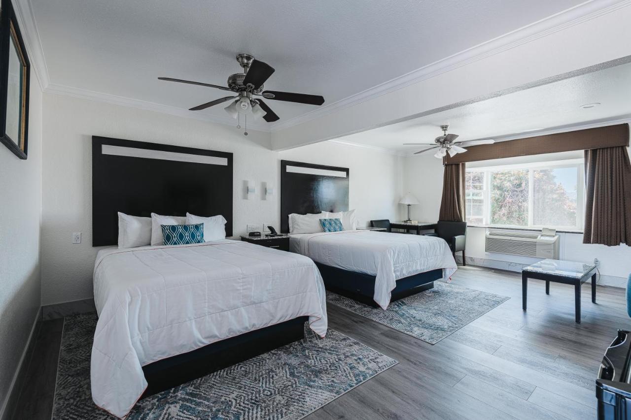 Deluxe Two Queen Bed Room Suite - Upstairs, Non-Smoking, No Pets at Sea Air Inn & Suites - Downtown - Restaurant Row