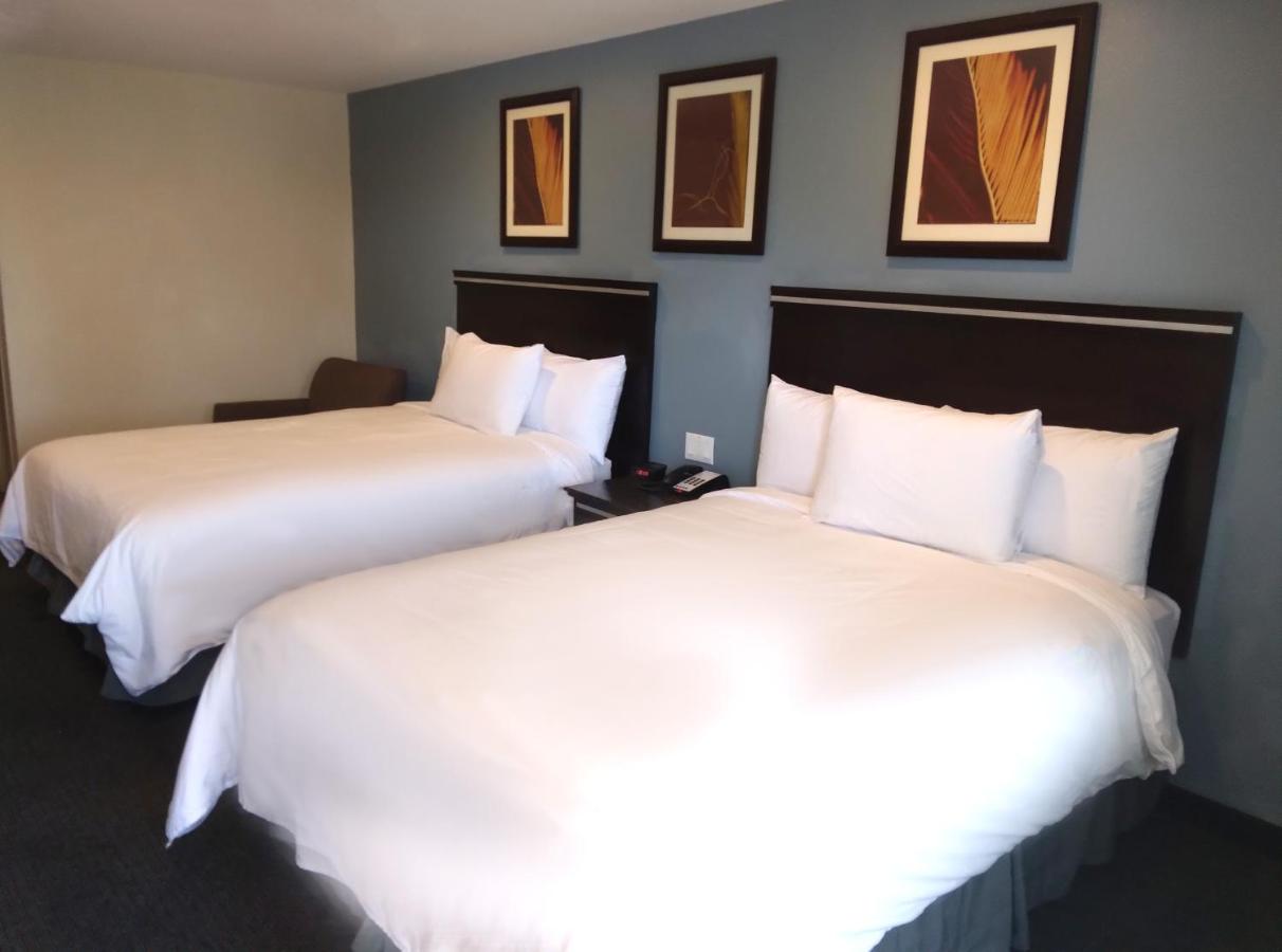 Queen Room with Two Queen Beds at SureStay Hotel by Best Western Chula Vista San Diego Bay
