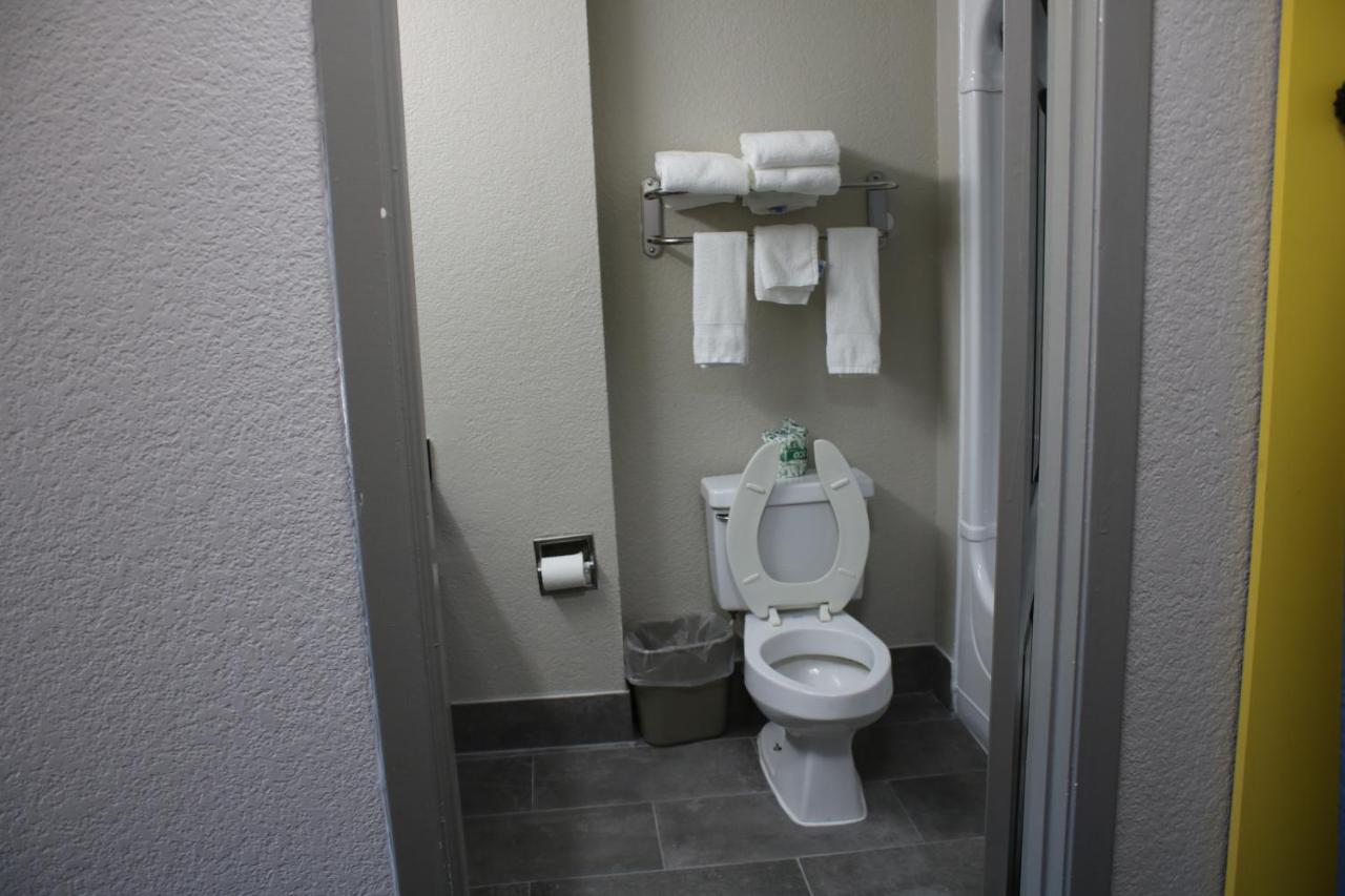 Queen Room with Two Queen Beds - Non-Smoking at Days Inn by Wyndham Waco University Area