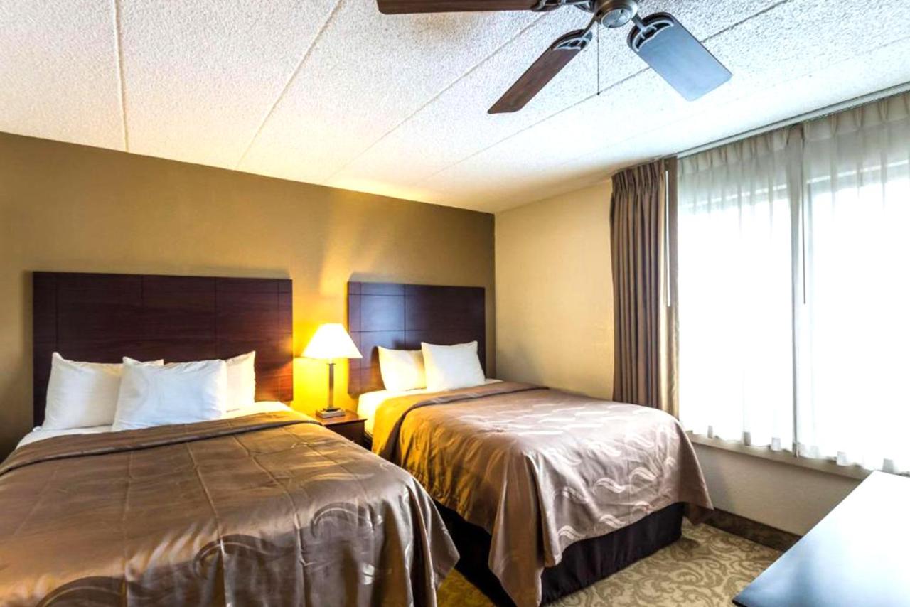 Standard Queen Room with Two Queen Beds at Norwood Inn & Suites Milwaukee