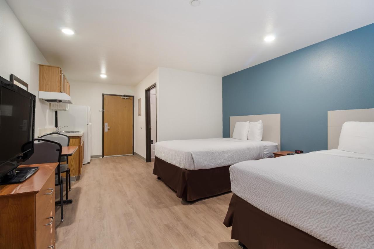 Double Studio with Two Double Beds at WoodSpring Suites Houston I-45 Airtex