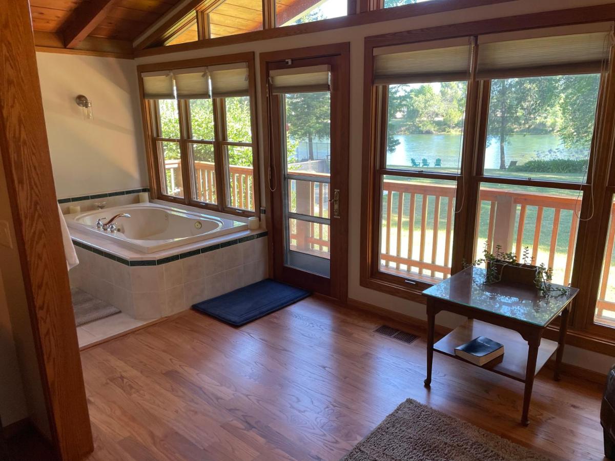 | Luxury Riverside Estate - 3BR Home or 1BR Cottage or BOTH - Sleeps 14 - Swim, fish, relax, refresh