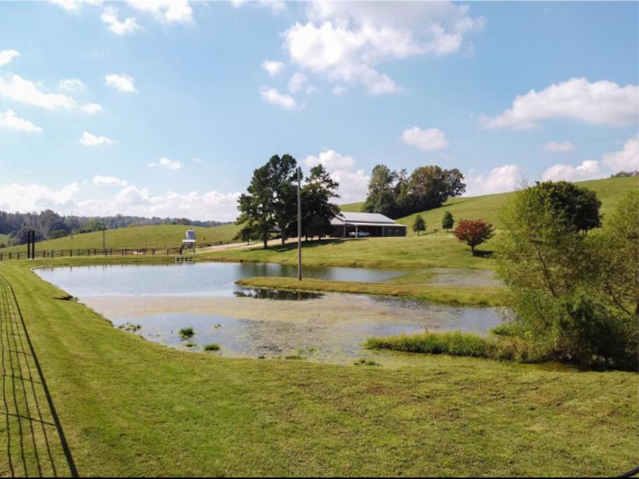 | Unique home on a beautiful ranch w/ stocked pond