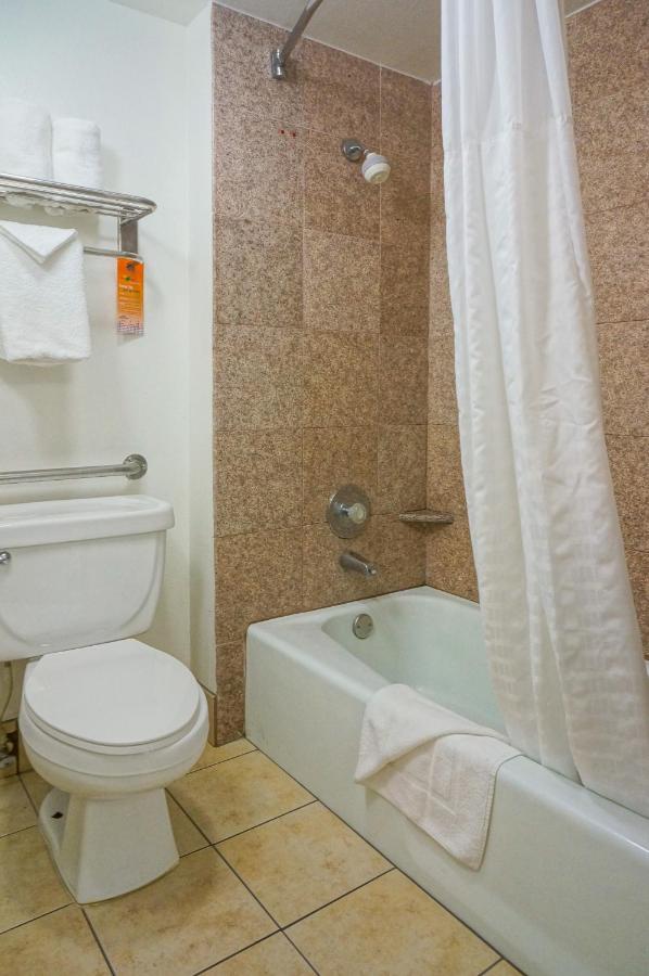 Queen Room with Two Queen Beds at Howard Johnson by Wyndham San Diego Hotel Circle