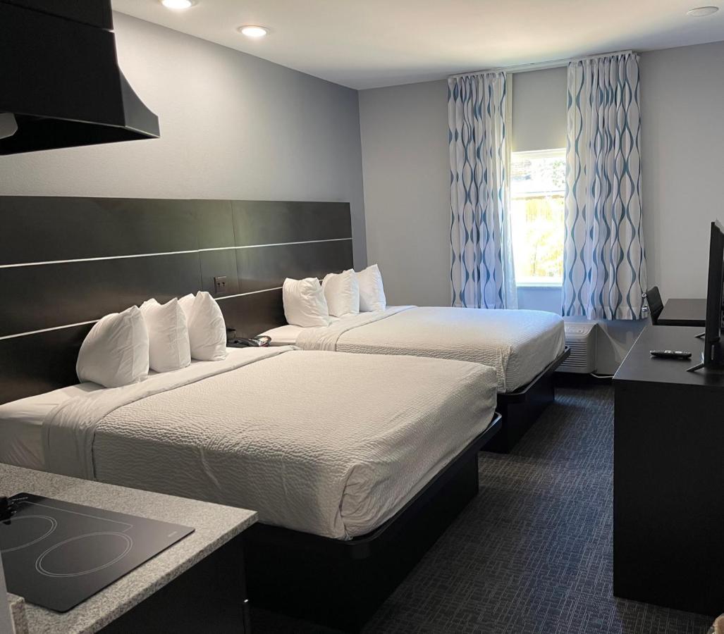 Queen Room with Two Queen Beds and Kitchenette - Non-Smoking at Days Inn by Wyndham Zachary LA
