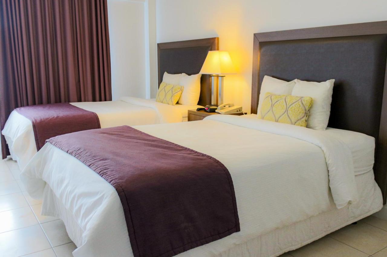 Standard Double Room with Two Double Beds - No Resort Fee at Collins Hotel