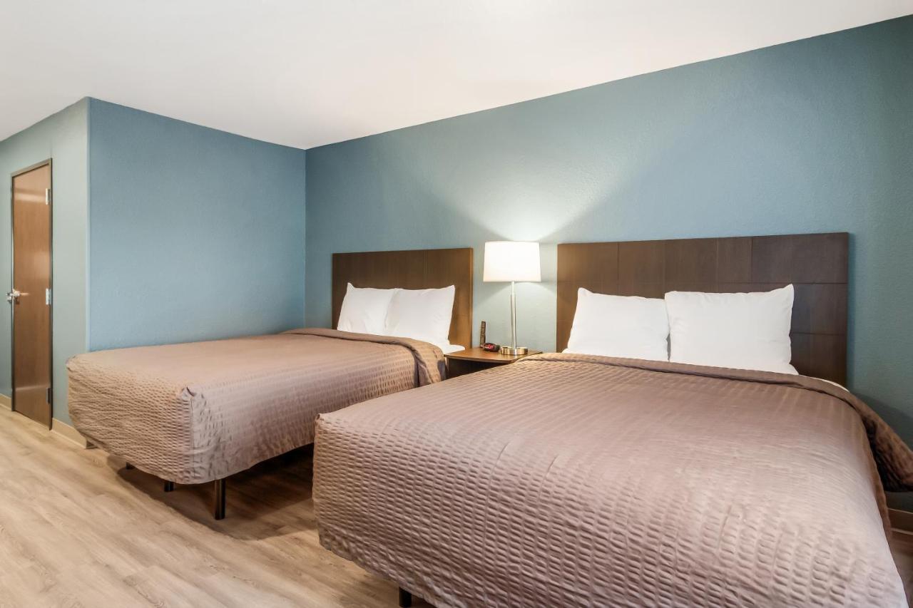 Queen Suite with Two Queen Beds and Dishwasher - Non Smoking at WoodSpring Suites Greensboro - High Point North