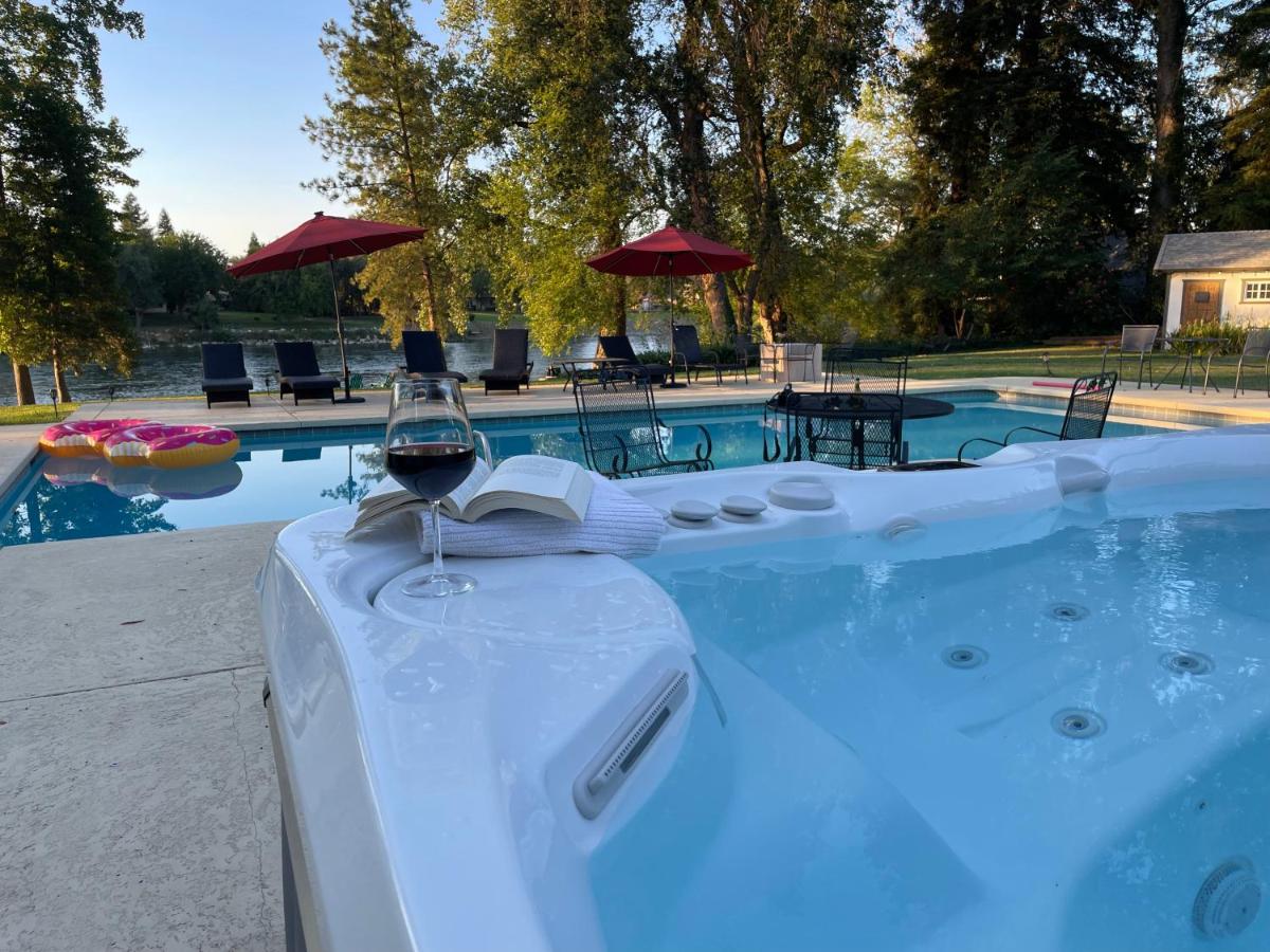 | Luxury Riverside Estate - 3BR Home or 1BR Cottage or BOTH - Sleeps 14 - Swim, fish, relax, refresh
