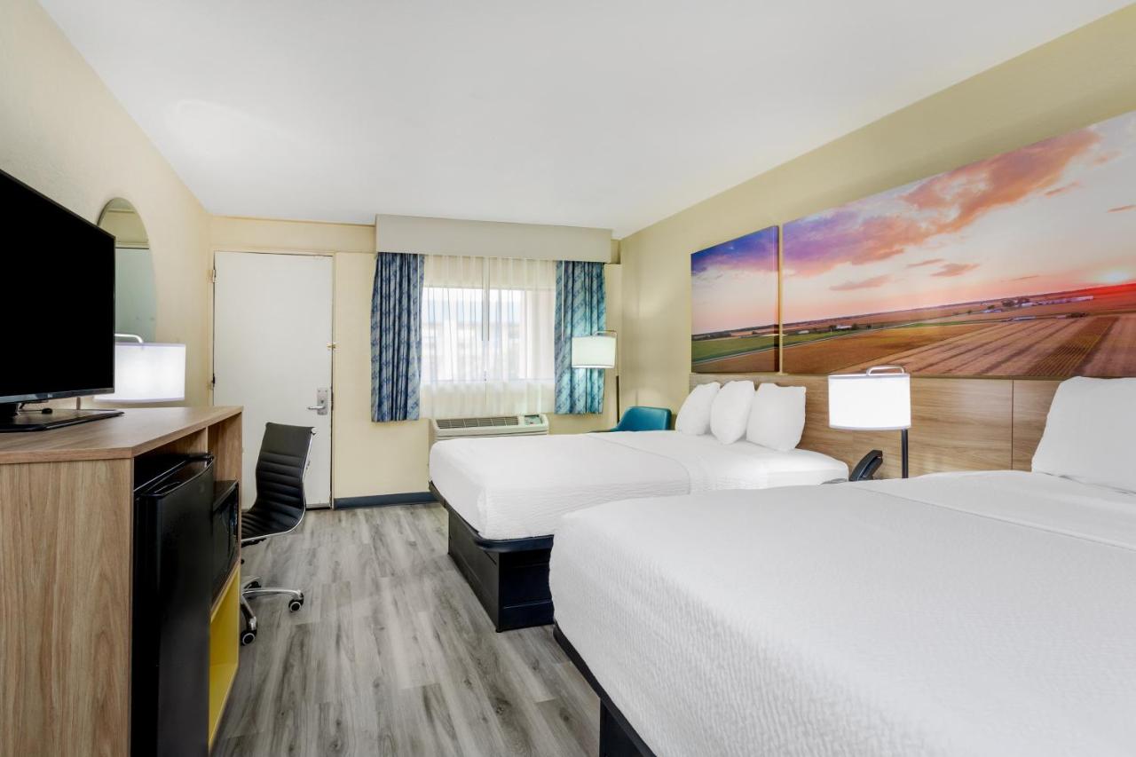 Queen Room with Two Queen Beds - Non-Smoking at Days Inn & Suites by Wyndham Clovis