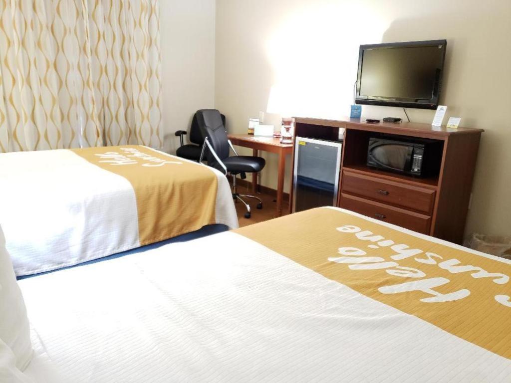 Queen Room with Two Queen Beds - Non-Smoking at Days Inn by Wyndham Greensboro NC