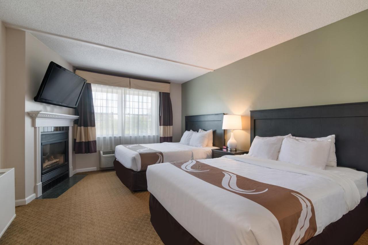 Standard Queen Room with Two Queen Beds with Fireplace - Non Smoking at Quality Inn & Suites