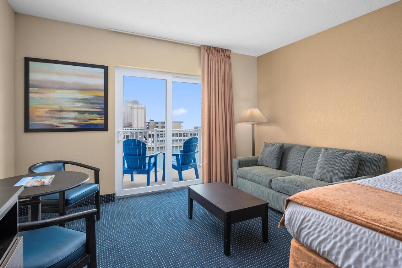 Queen Room with Two Queen Beds and Sofa - Partial Ocean View at Crystal Beach Hotel